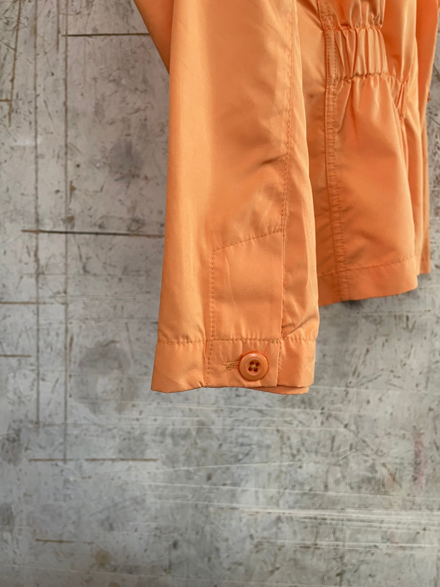 Vintage Orange Windbreaker Jacket with Appliqué Design